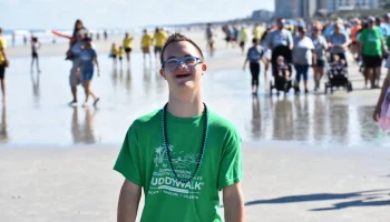 kid posing at the beach